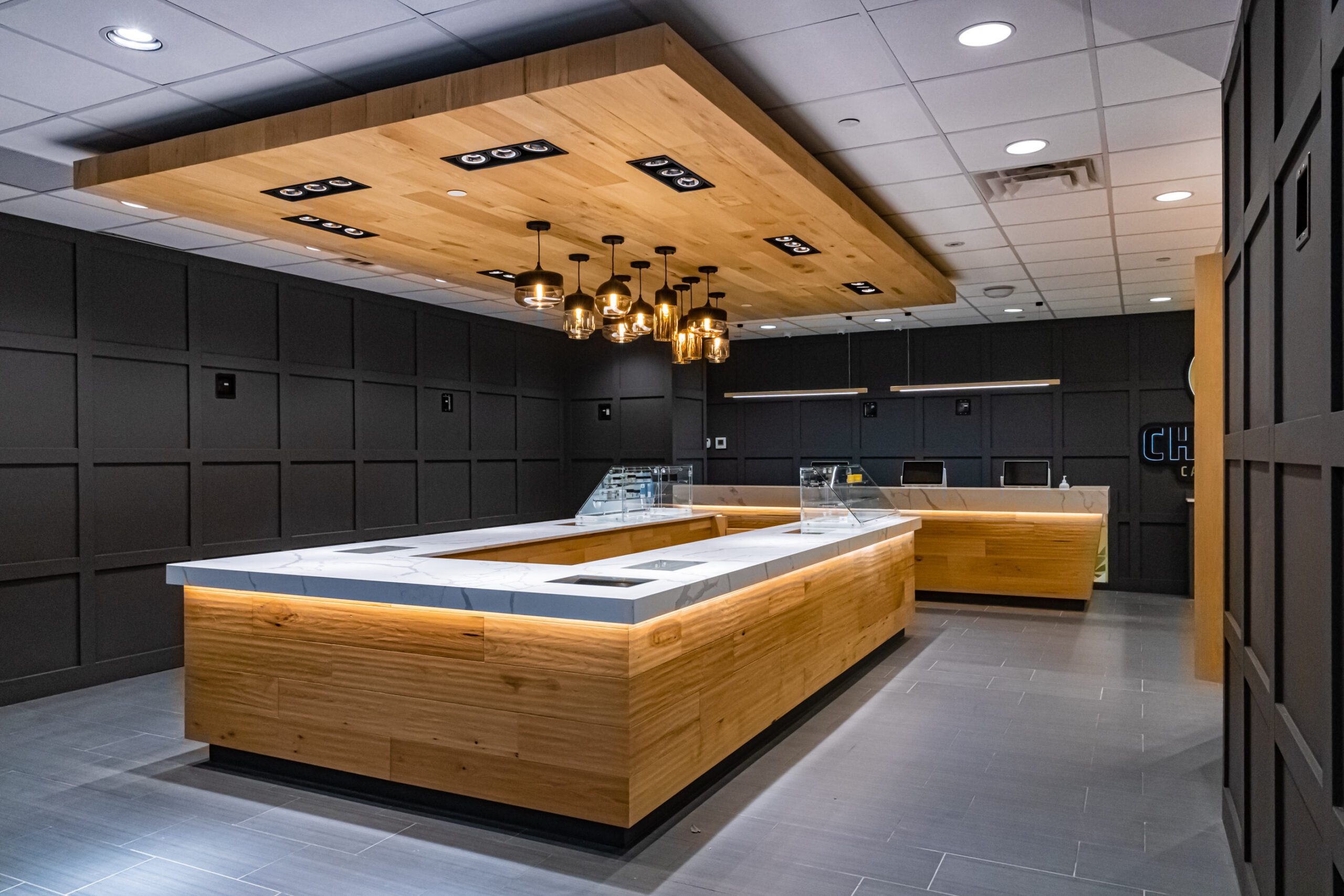 Interior view of Chamba Co. Waterloo showcasing modern design and cannabis product display.