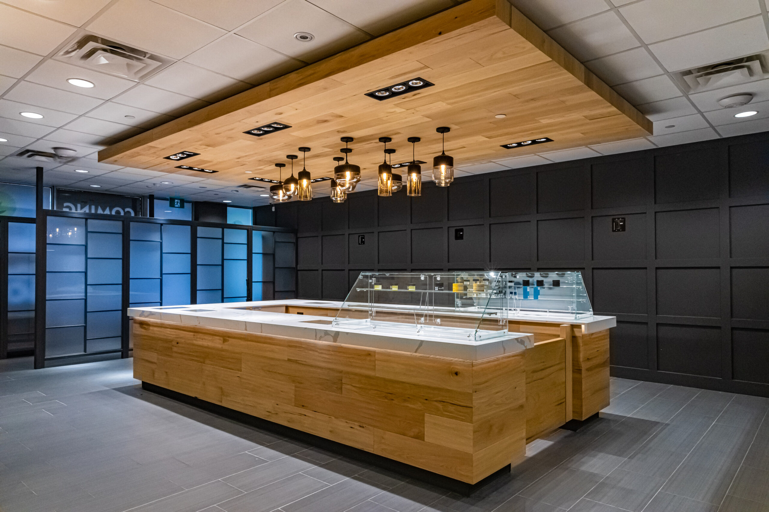 Wide-angle shot of Chamba Co. Waterloo's stylish cannabis store interior.