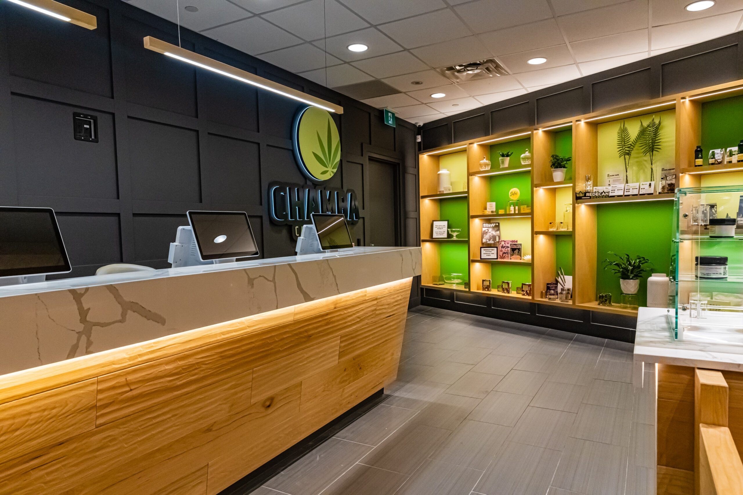 Checkout counter with digital screens at Chamba Cannabis Co. Waterloo store
